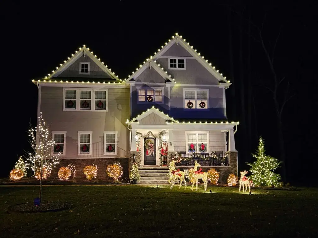 Christmas Lights on Shrubs and Light Deer on Front Yard