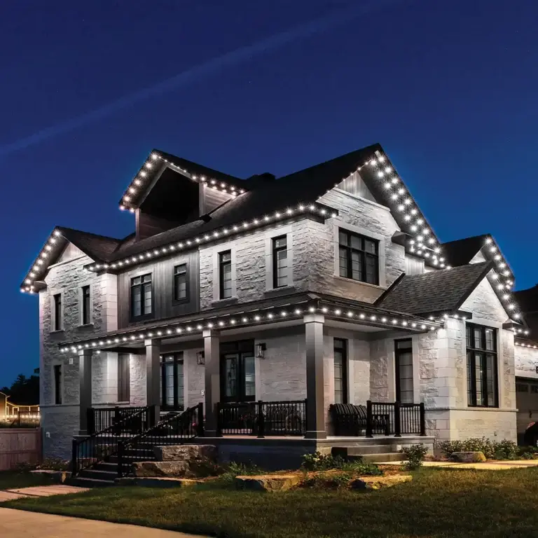 White Lights on White Stone House